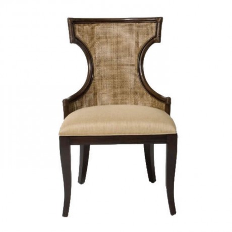 Dark wood chair with beige fabric upholstery