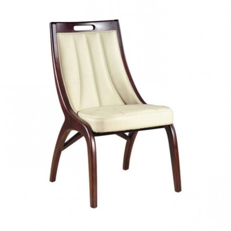 Contemporary chair with white leather upholstery and turned legs