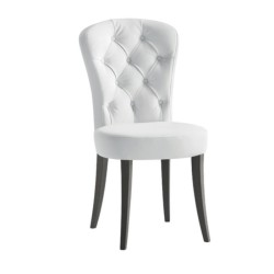 Round model chair with quilted white upholstery Round model chair with quilted white upholstery